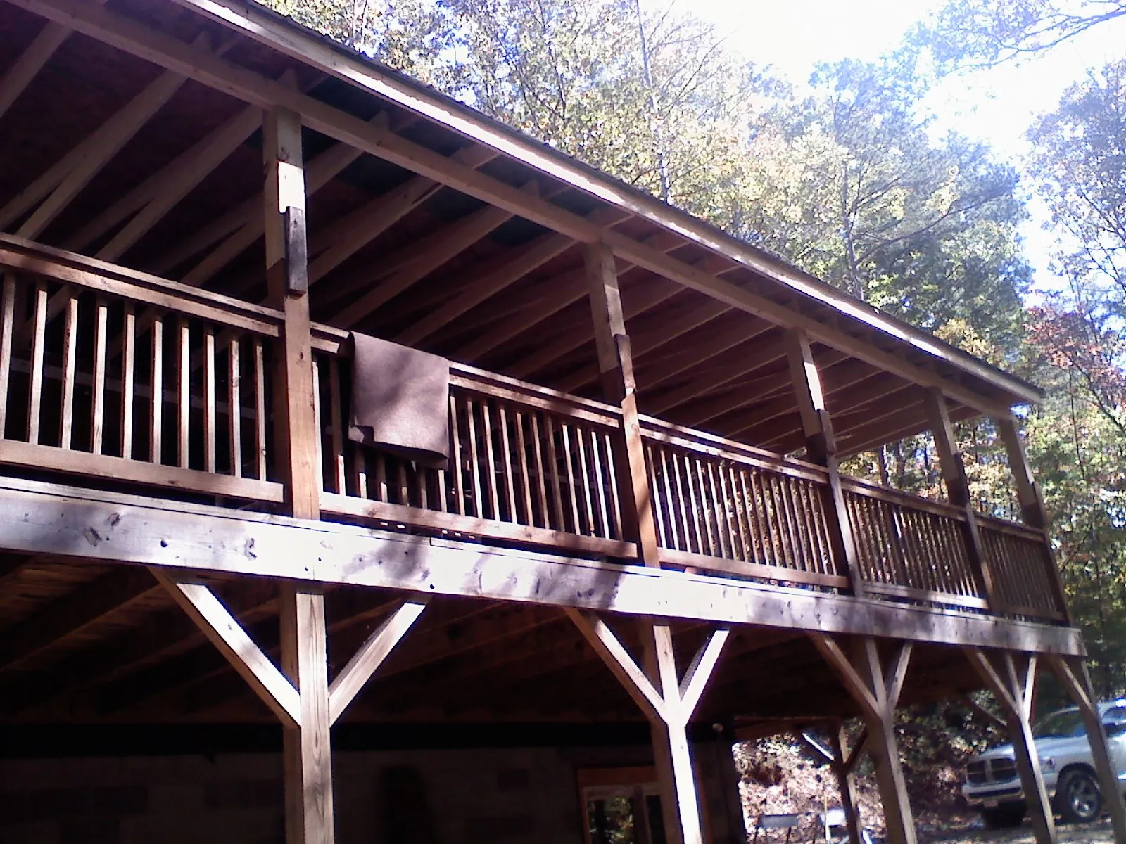Timber framing under a new elevated porch and deck — Roof Leak Repair in North Royalton by Roofing Brothers